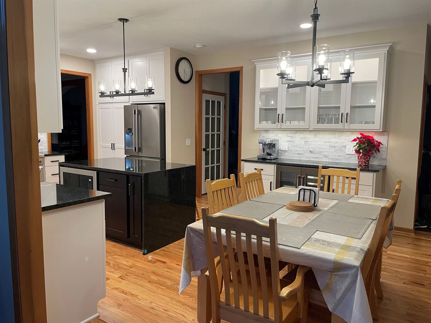 Kitchen island and dining area remodel by Stellar Construction
