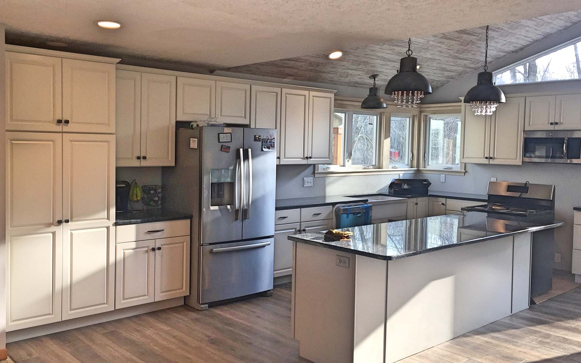 Kitchen remodel in progress with new cabinetry by Stellar Construction