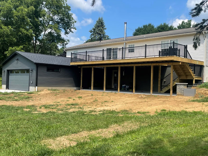 Raised deck and garage addition by Stellar Construction
