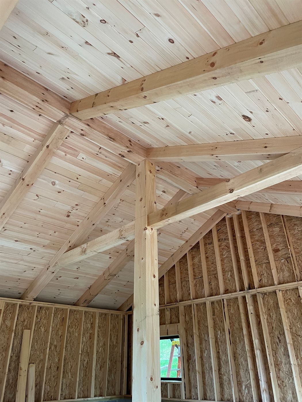 Timber-frame addition under construction, managed on-site by Stellar Construction